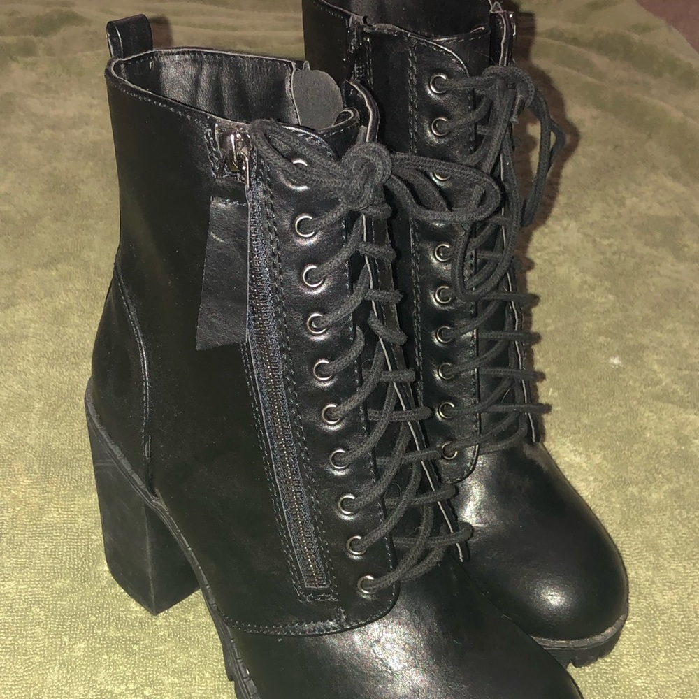 Black High-Heel Moto boots. “Soda” brand, size 8.